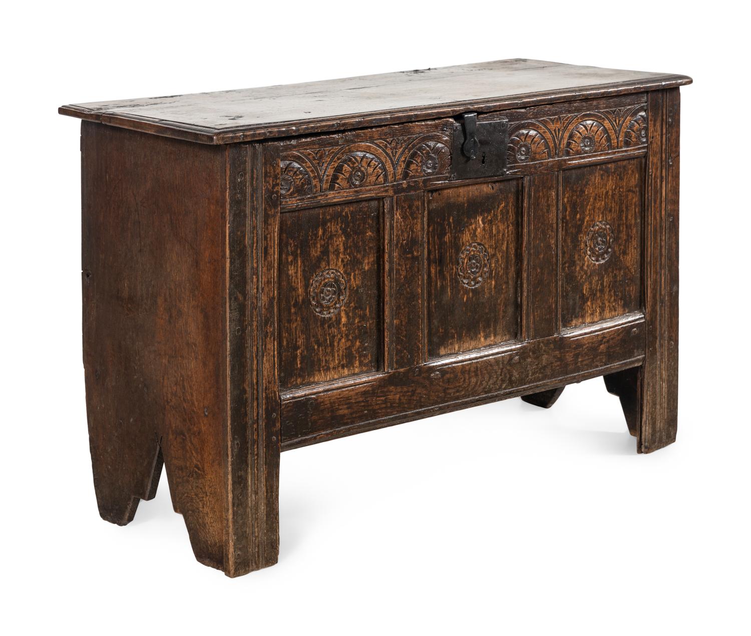 A Charles II Carved Oak Plank Chest
