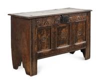 A Charles II Carved Oak Plank Chest