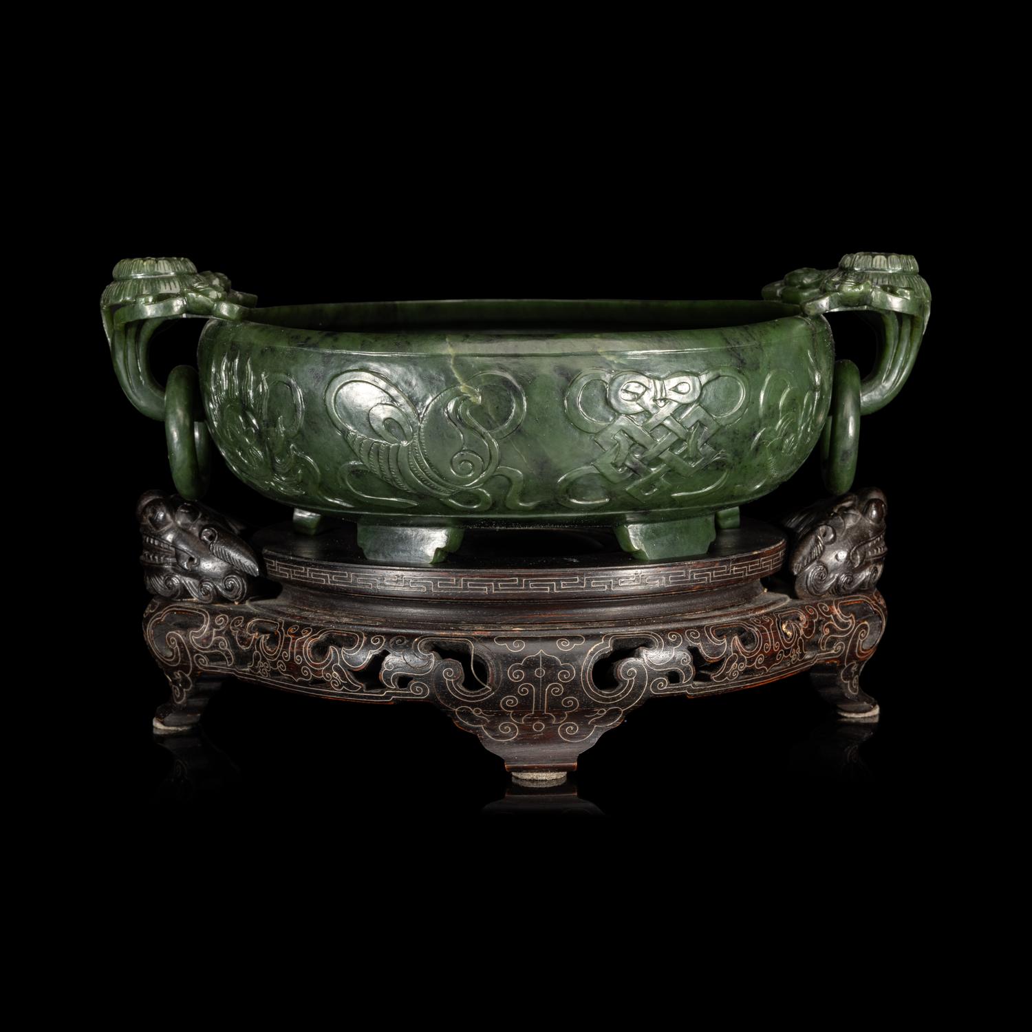 A Chinese Carved Spinach Jade Marriage Bowl, Late Qing/Republic Period 晚清/民國 碧玉雙魚活環洗