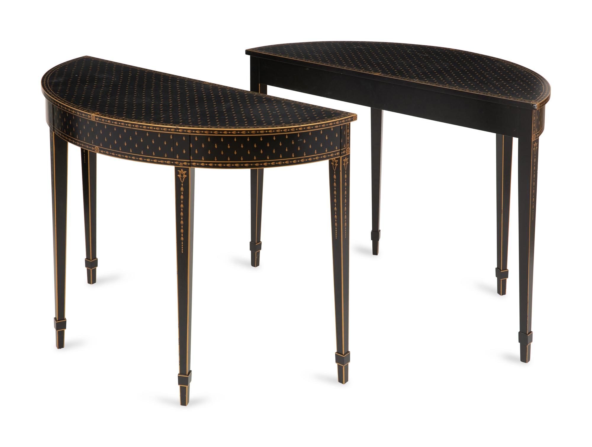 A Pair of Black and Gold-Painted Console Tables