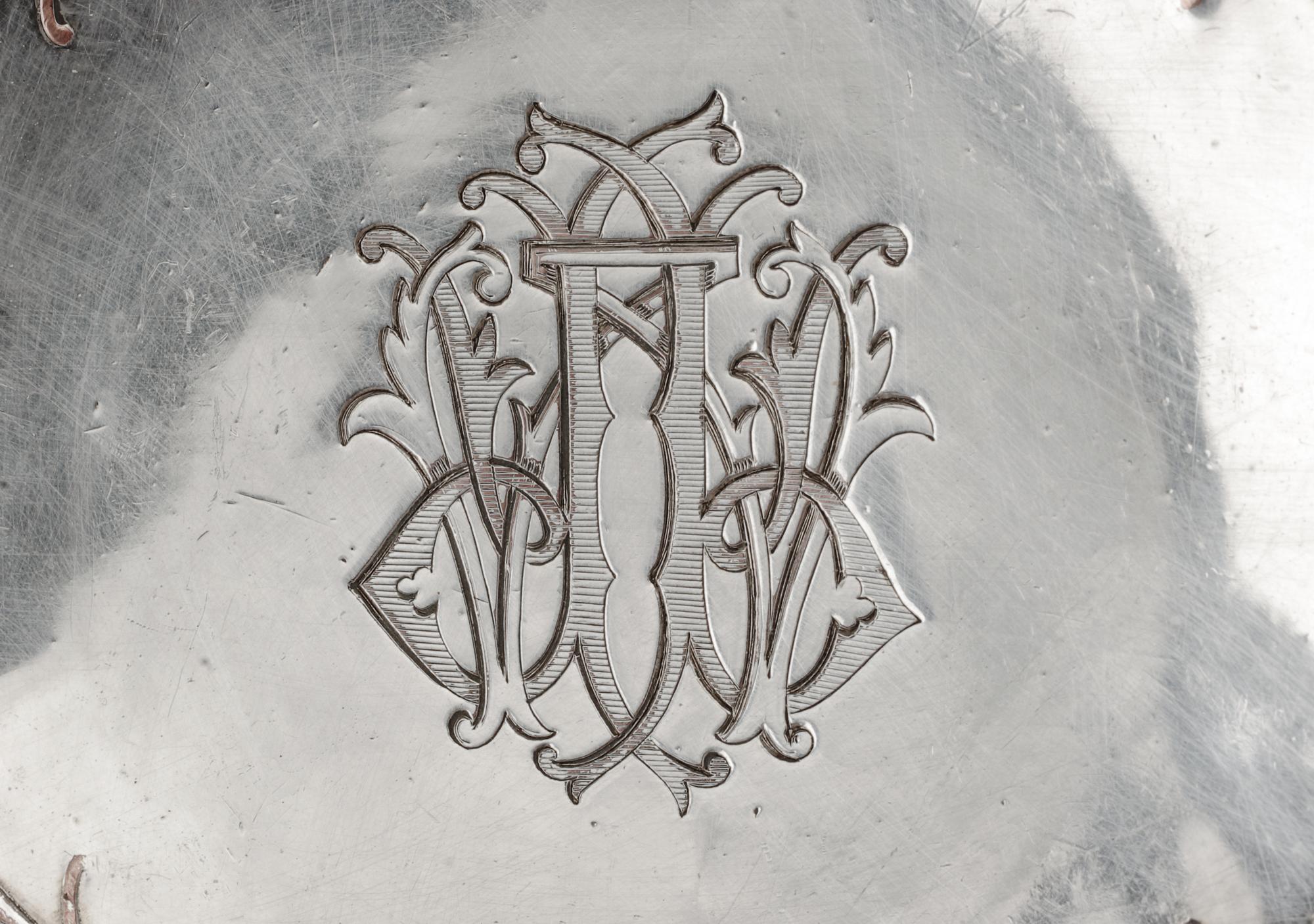 A Pair of French Silver-Plate Serving Bowls, Christofle, Paris, Late 19th Century, each of handled form with mask decoration.