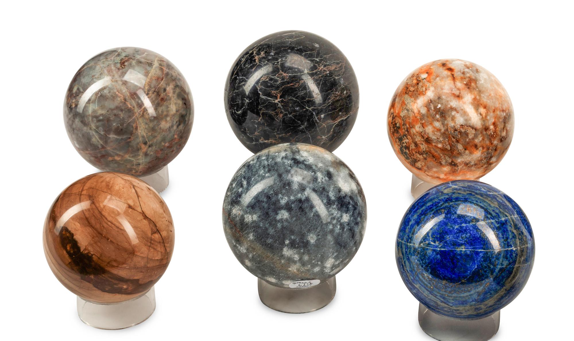 A Set of Nine Specimen Marble Spherical Ornaments