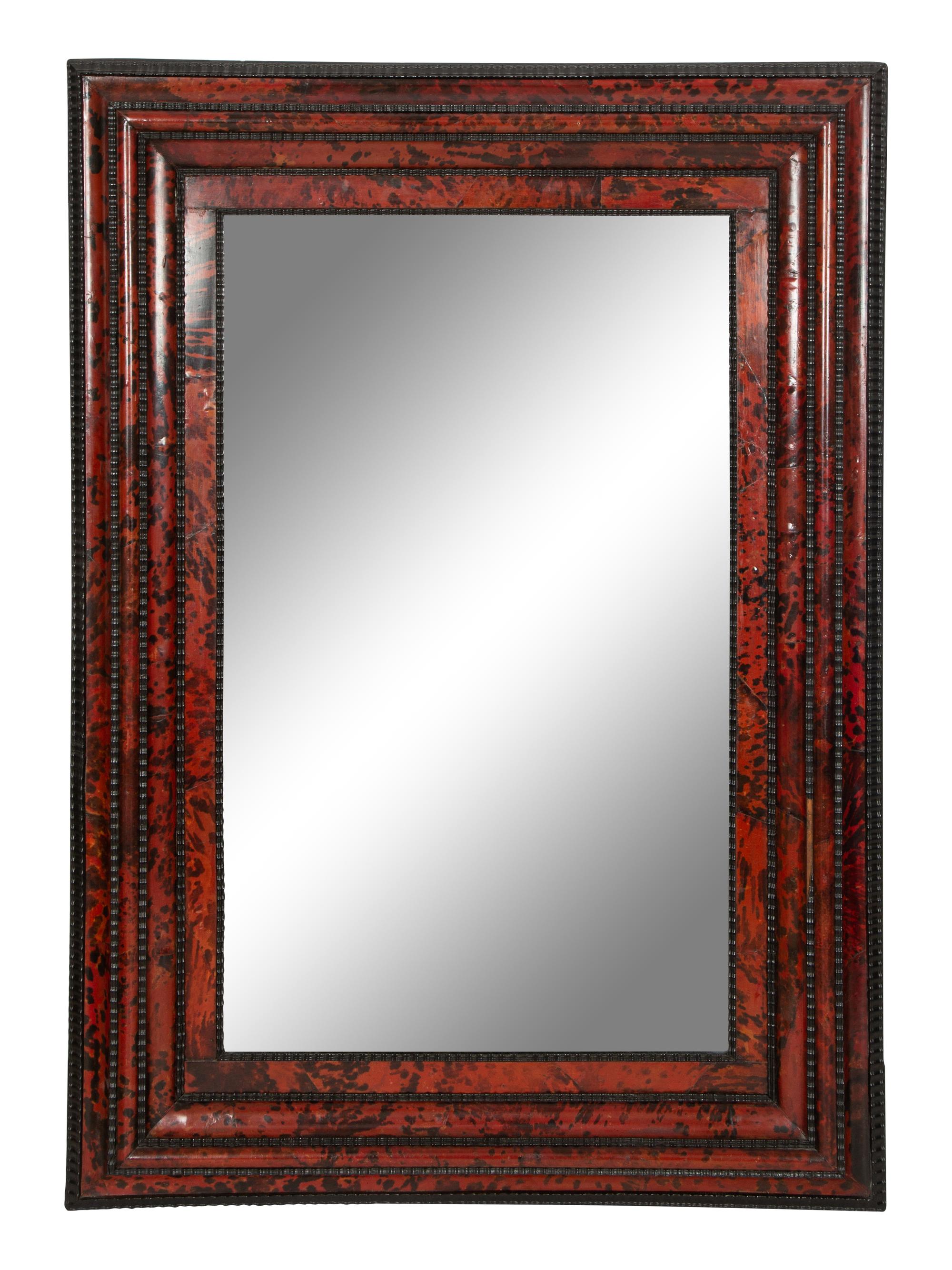 A Flemish Faux Tortoise Shell and Parcel Ebonized Mirror