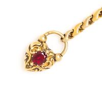 A Georgian Yellow Gold and Garnet Lover's Eye Padlock Charm Bracelet, 6.70 dwts.