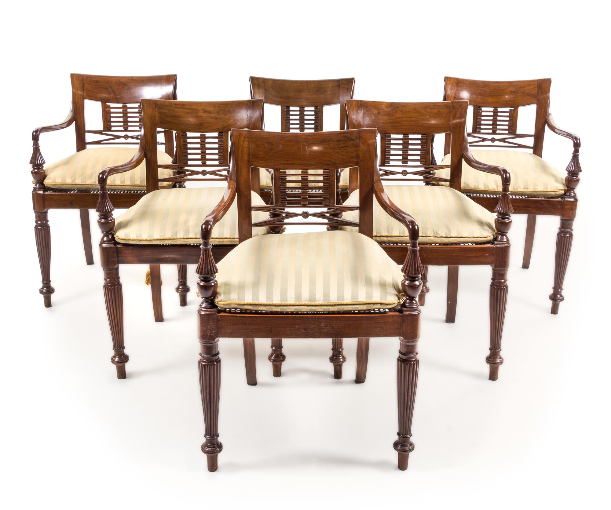 A Group of Six Anglo-Colonial Style Mahogany Armchairs Height 32 3/4 inches. — 19TH CENTURY