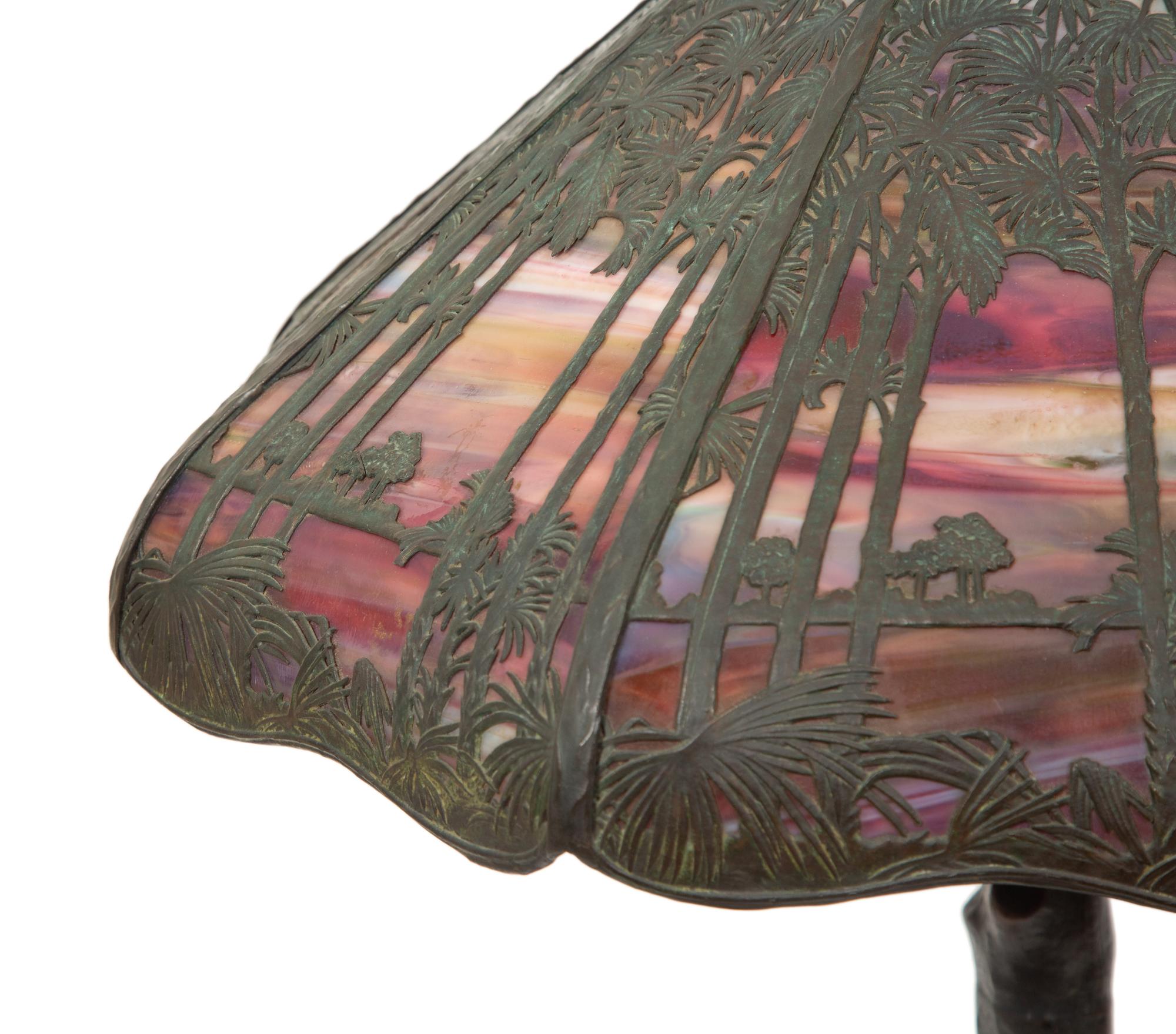 A Handel Bronze and Slag Glass Palm Tree and Sunset Table Lamp