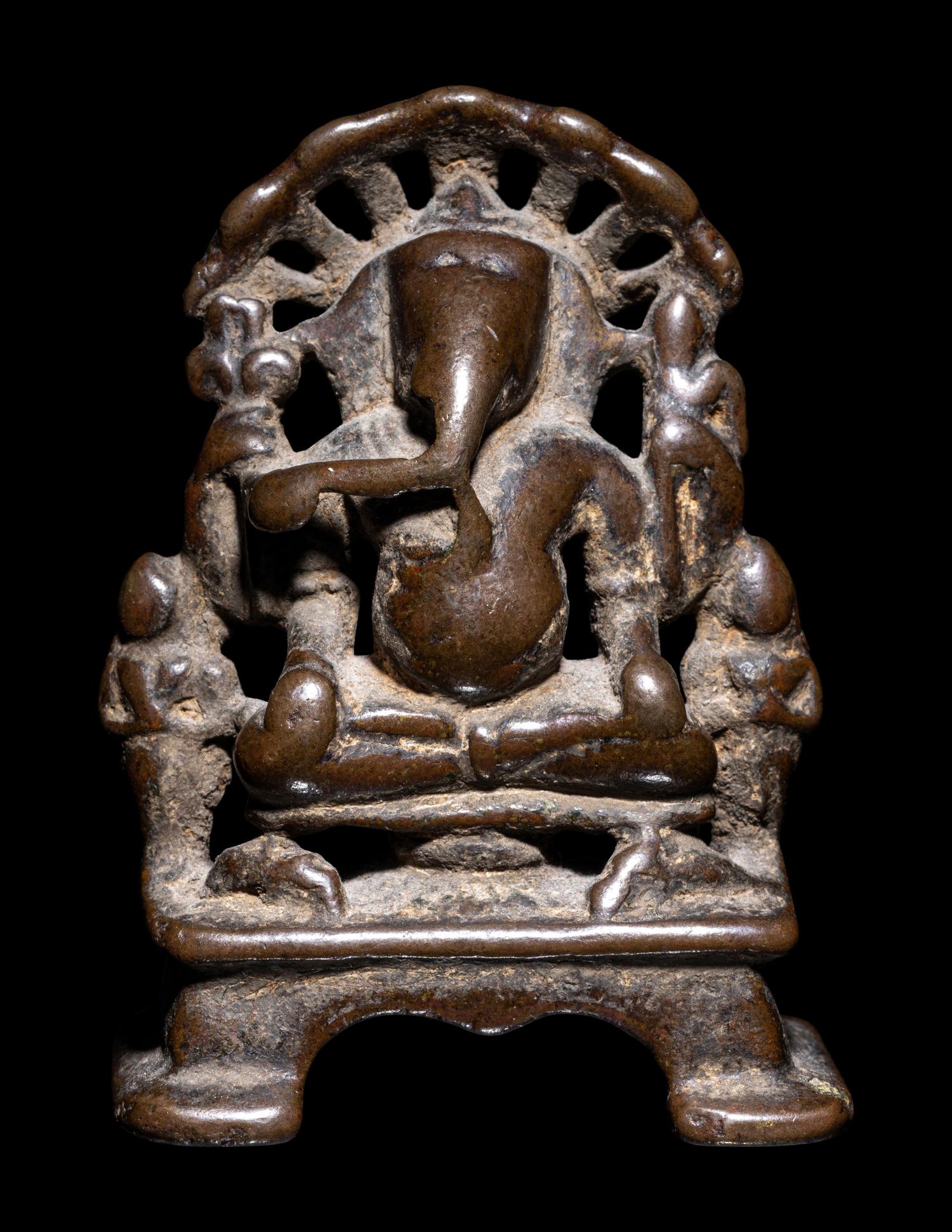A Small Indian Bronze Figure of Ganesha