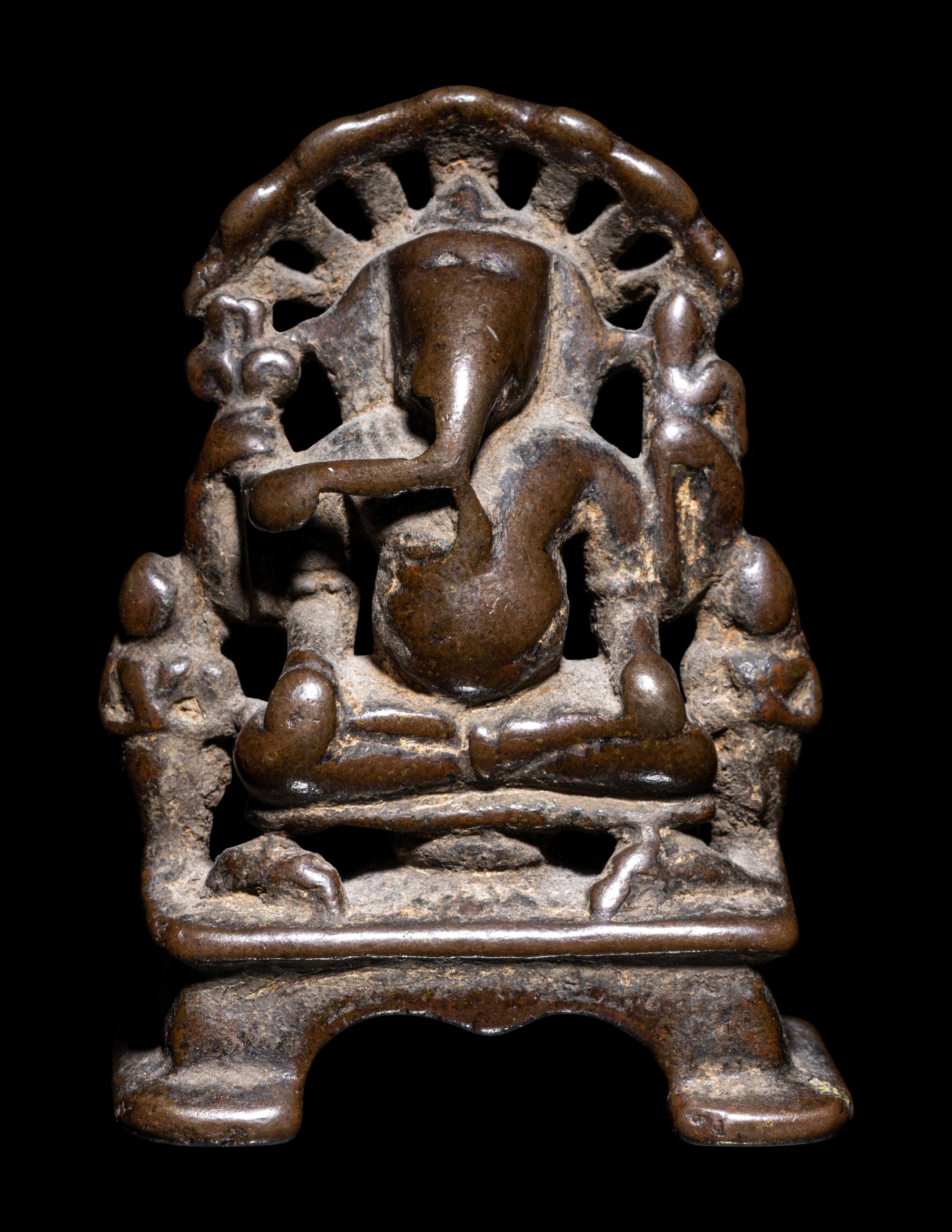 A Small Indian Bronze Figure of Ganesha