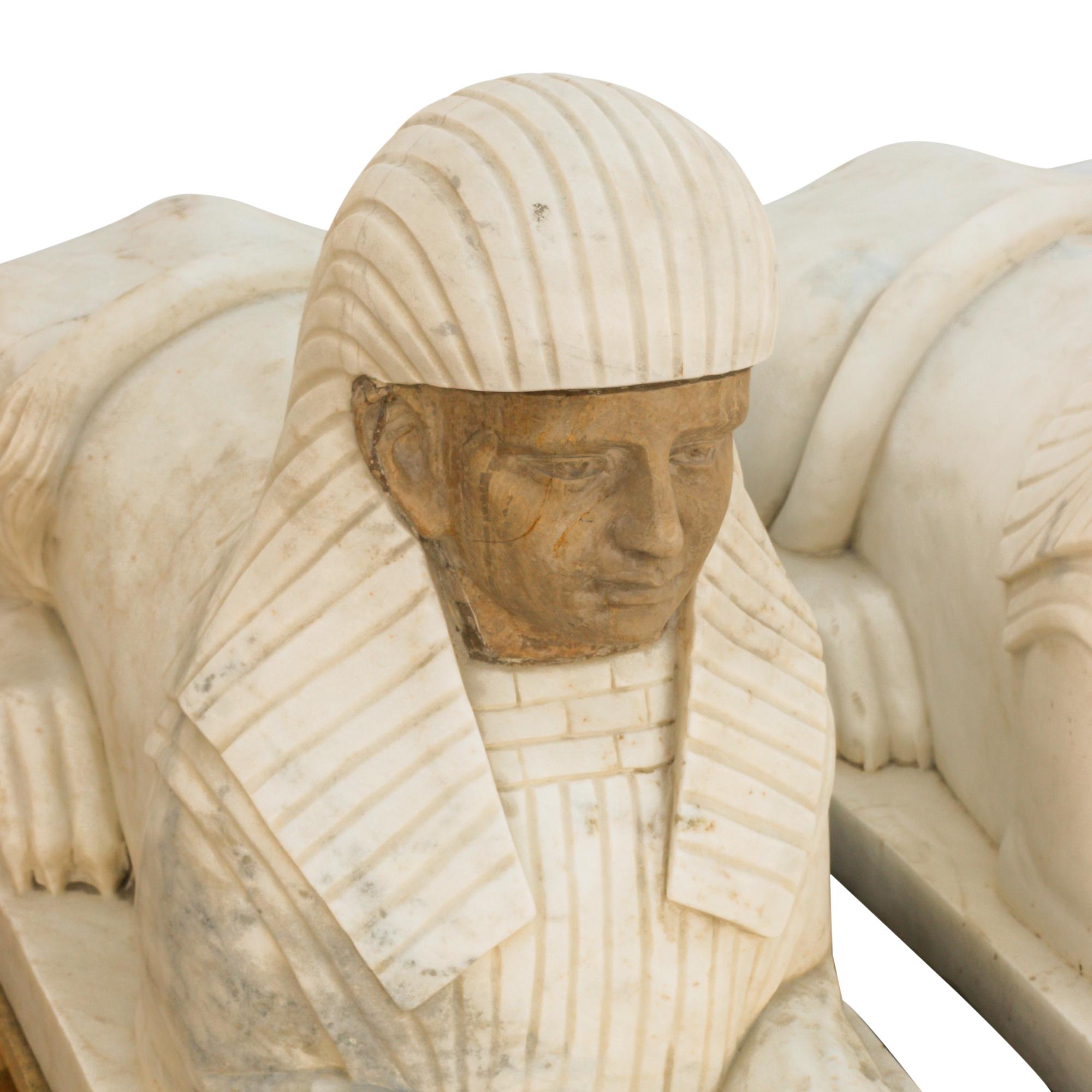 A Pair of Italian Marble Sphinxes