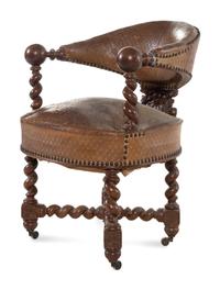 A Continental Renaissance Revival Carved Walnut Armchair