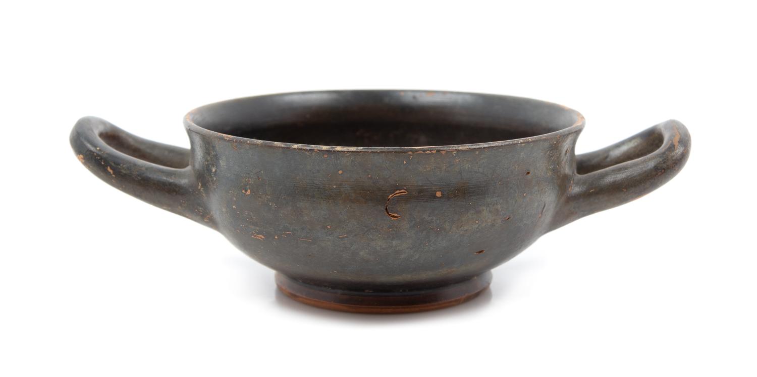 A Greek Silp Decorated Pottery Wine Cup Diameter 6 inches.