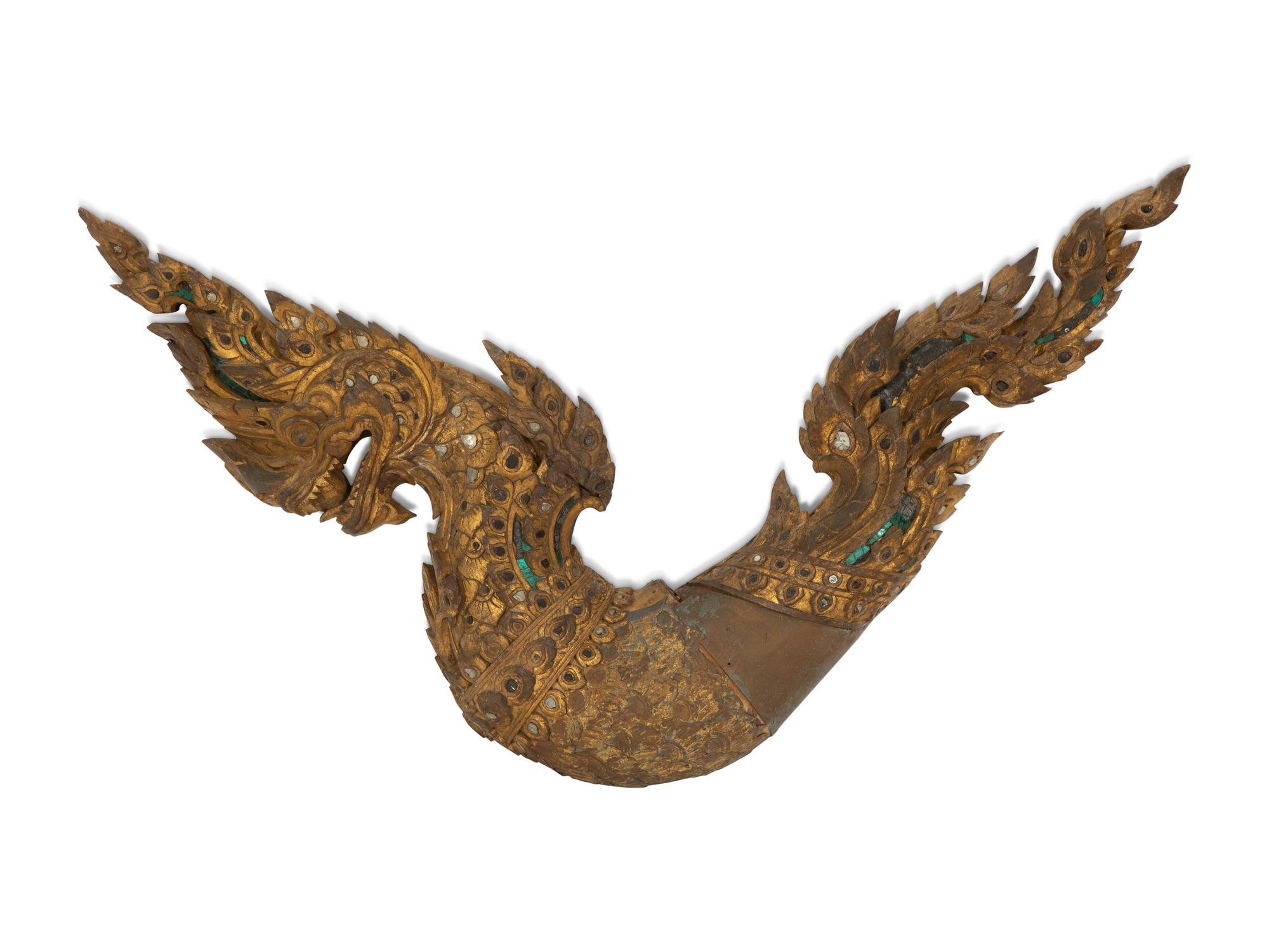 A Large Thai Giltwood and Mirror-Inset Dragon Ornament