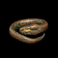 An Egyptian Gilt-Bronze Snake Ring