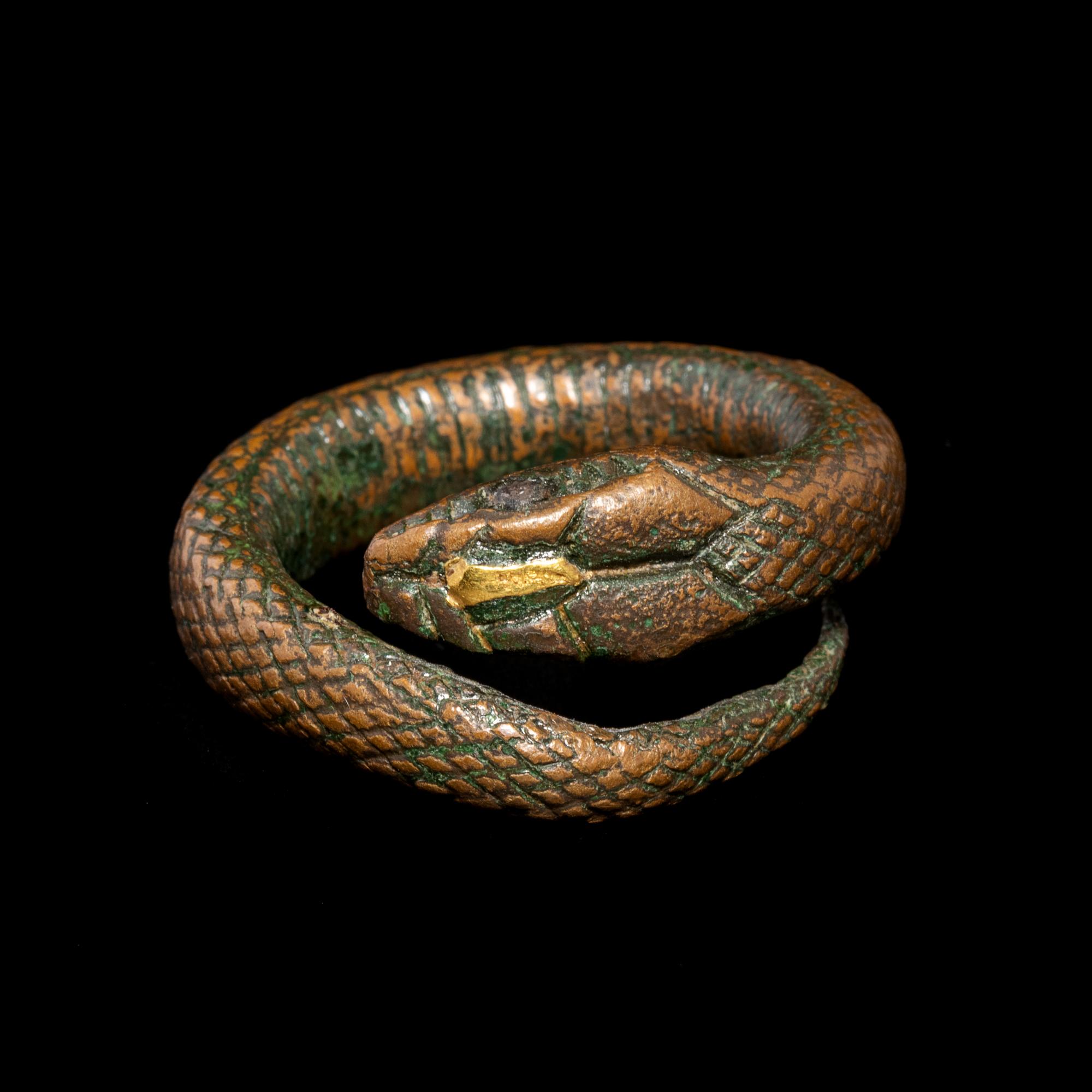 An Egyptian Gilt-Bronze Snake Ring