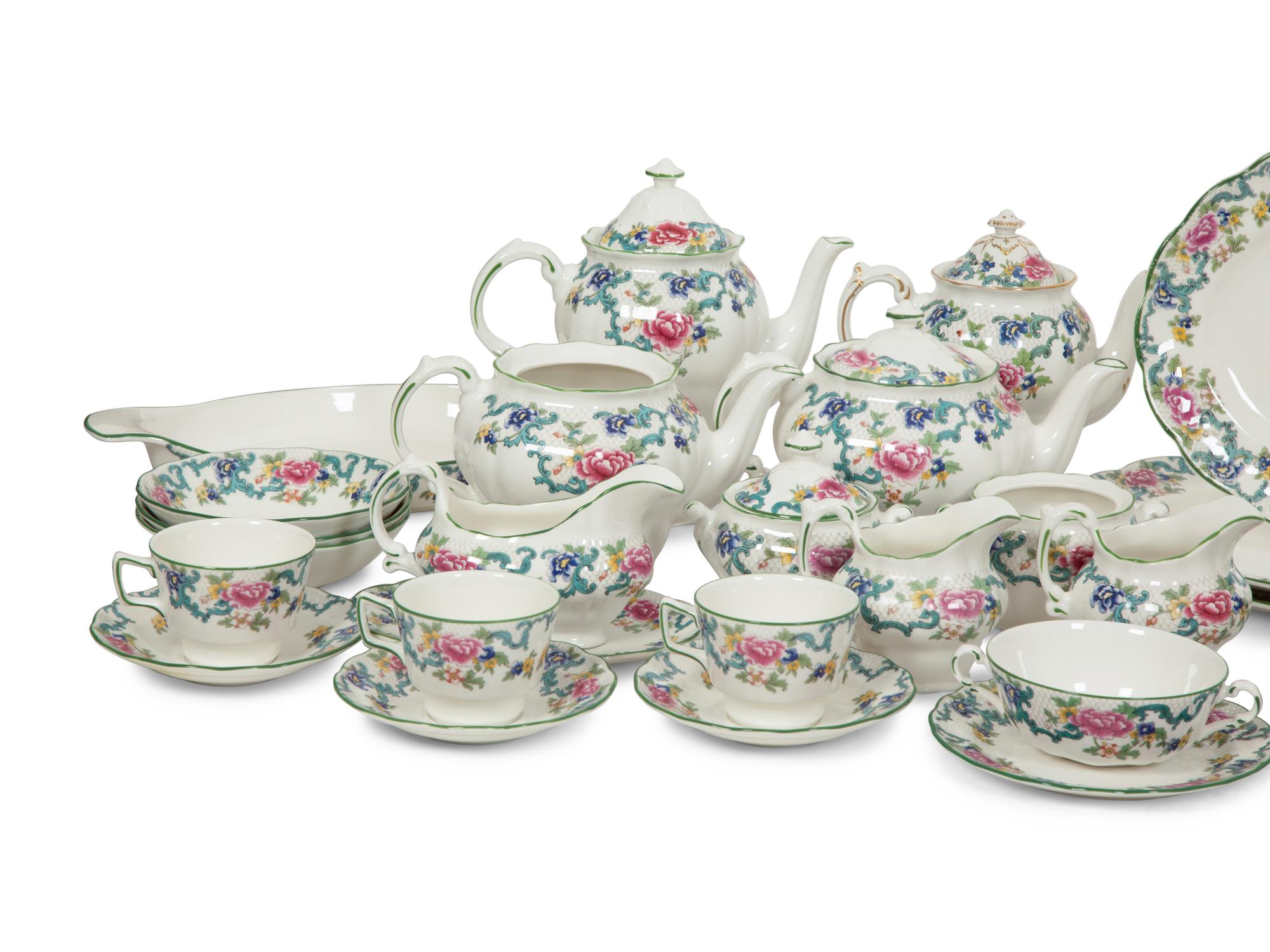 A Royal Doulton Floradora Green Porcelain Dinner Service