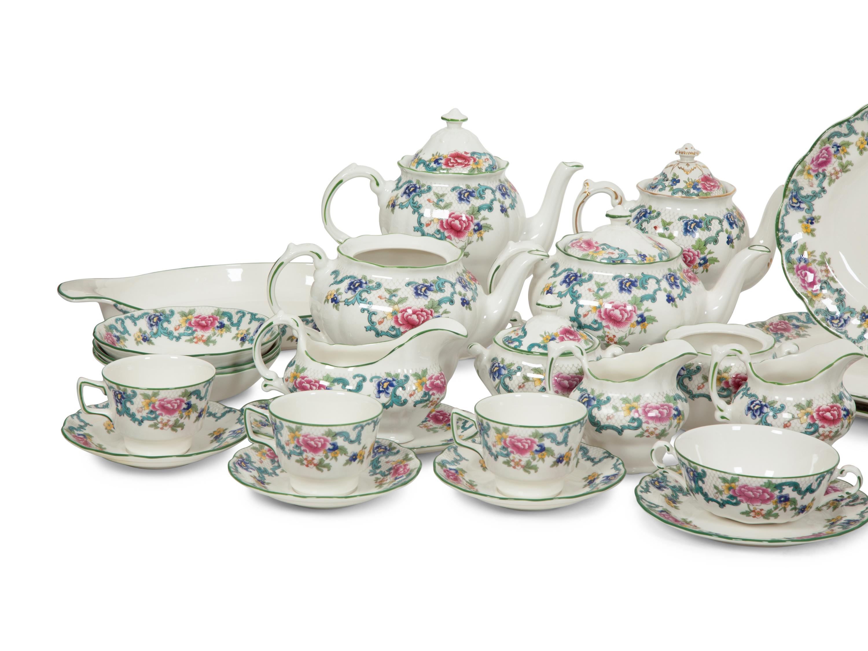 A Royal Doulton Floradora Green Porcelain Dinner Service
