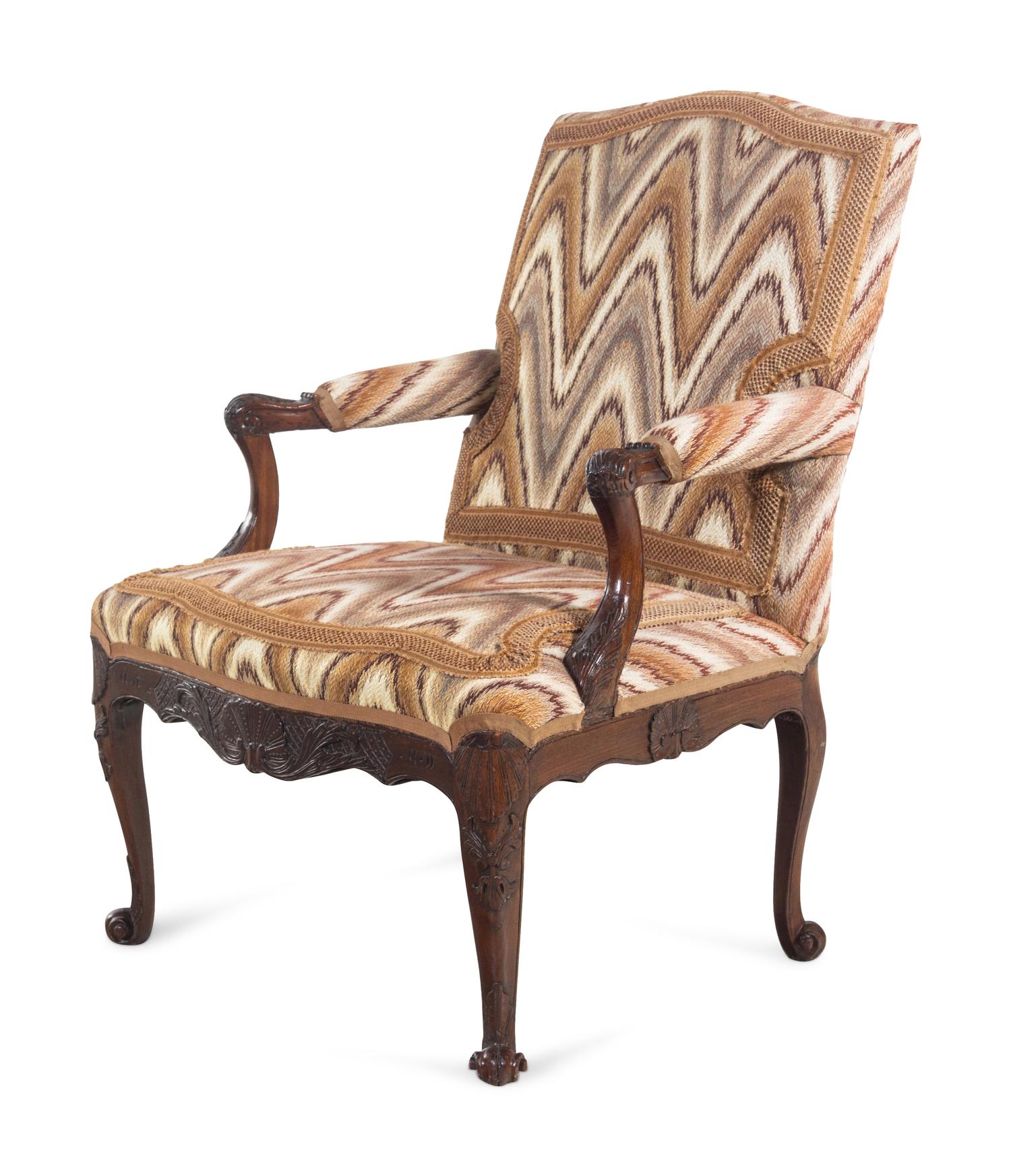A Régence Style Carved Walnut Fauteuil