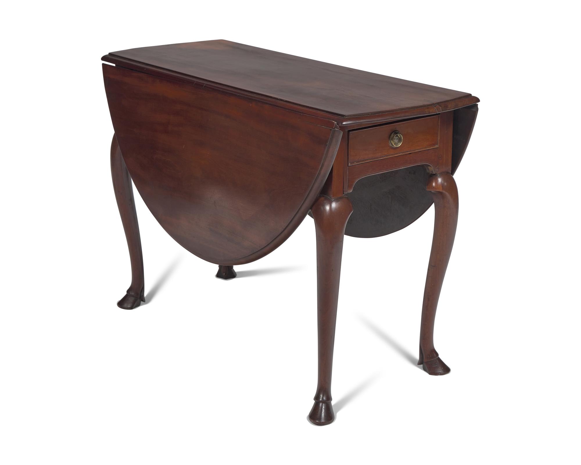 An Irish George II Mahogany Oval Drop-Leaf Table
