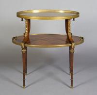 An American Gilt Metal Mounted Etagere, Height 28 3/4 x width 30 1/2 x depth 20 3/4 inches.