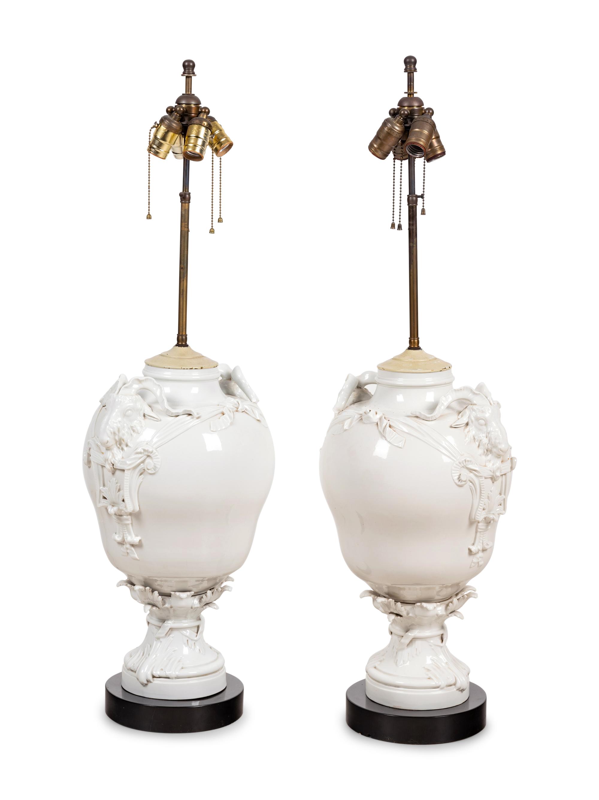 A Pair of German Blanc-de-Chine Porcelain Urns Mounted as Lamps