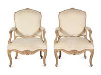 A Pair of Louis XV Style Bleached Wood Fauteuils