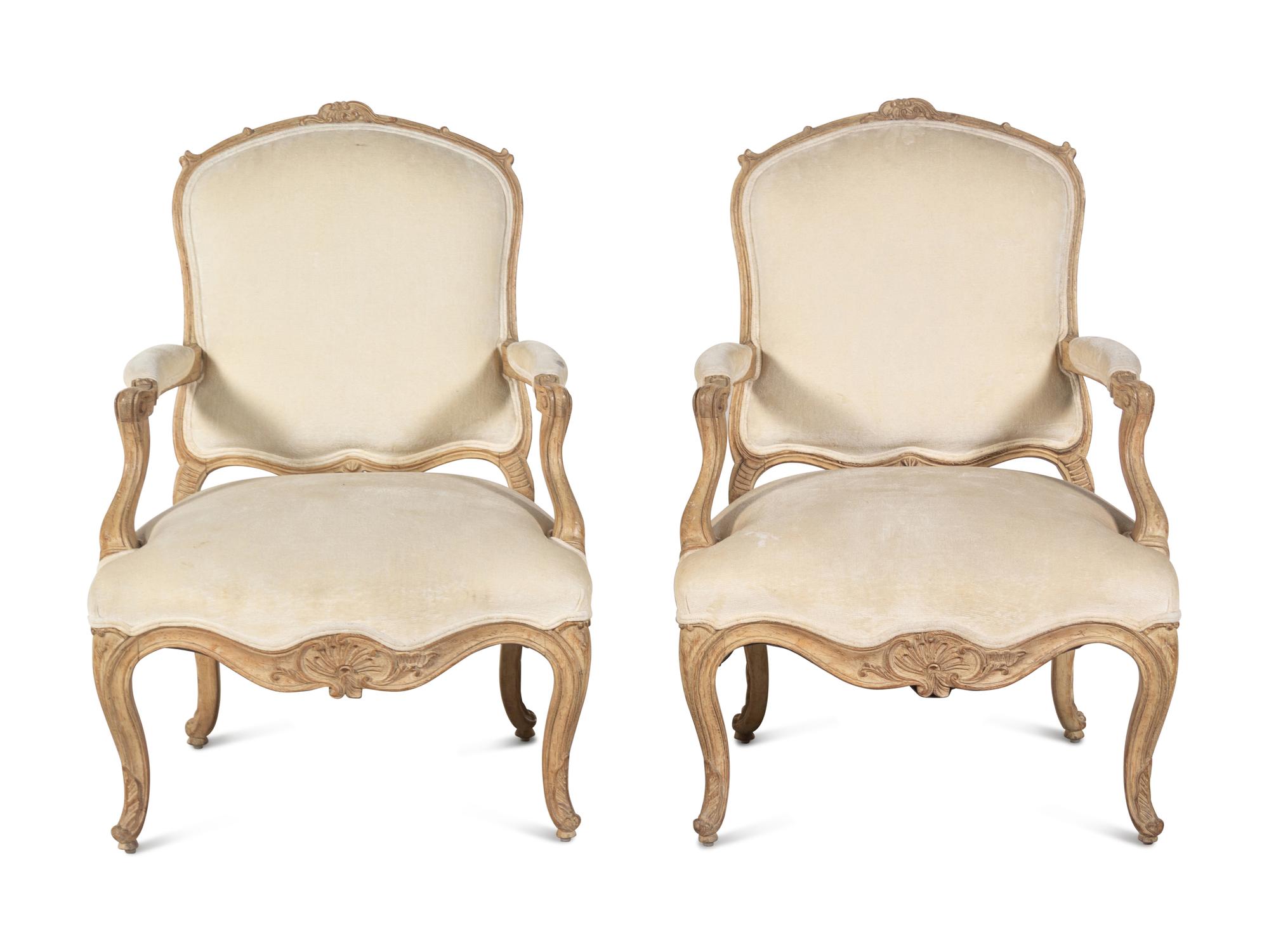 A Pair of Louis XV Style Bleached Wood Fauteuils
