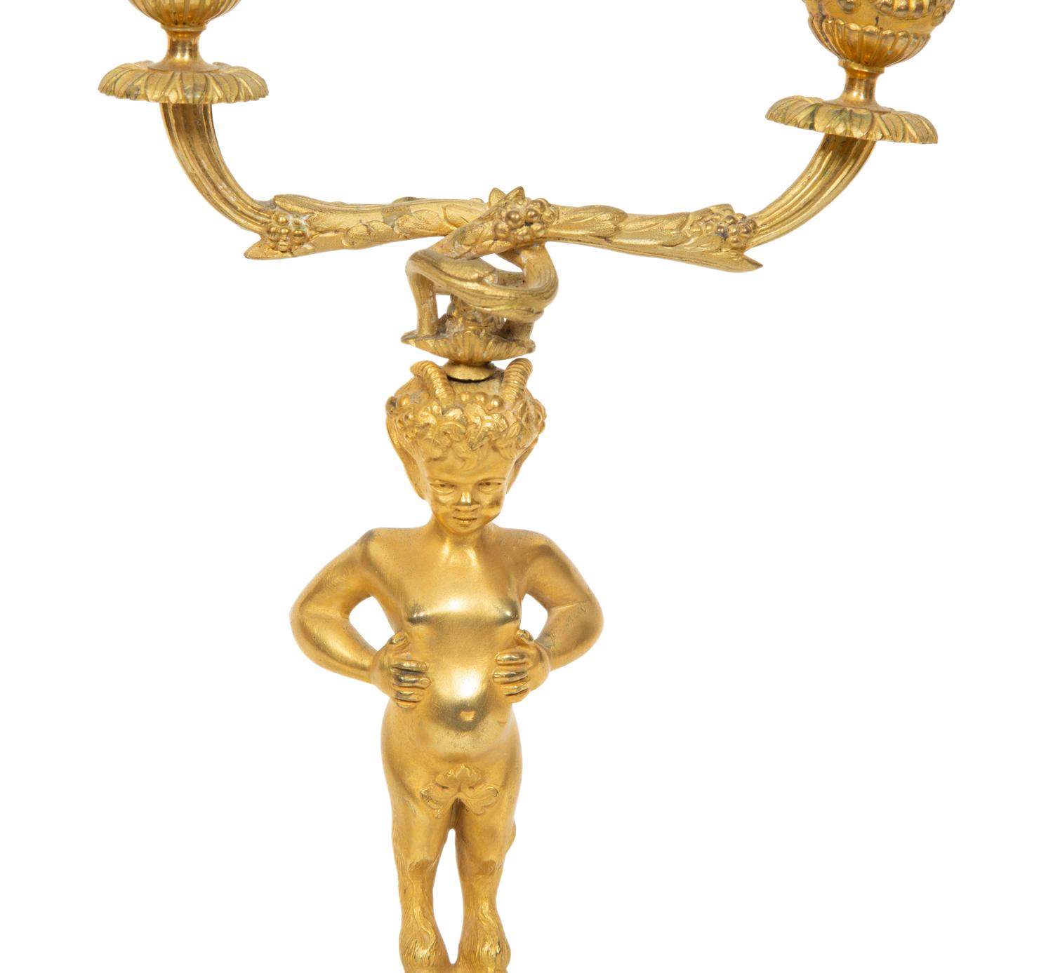 A Pair of French Gilt Bronze and Marble Figural Two-Light Candelabra
