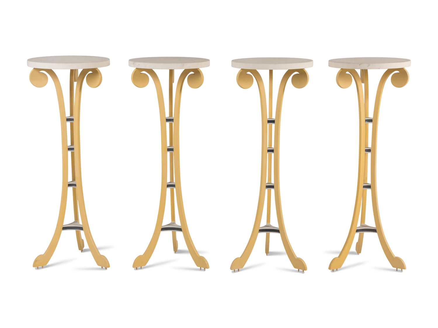 A Set of Four Painted Pedestal Tables