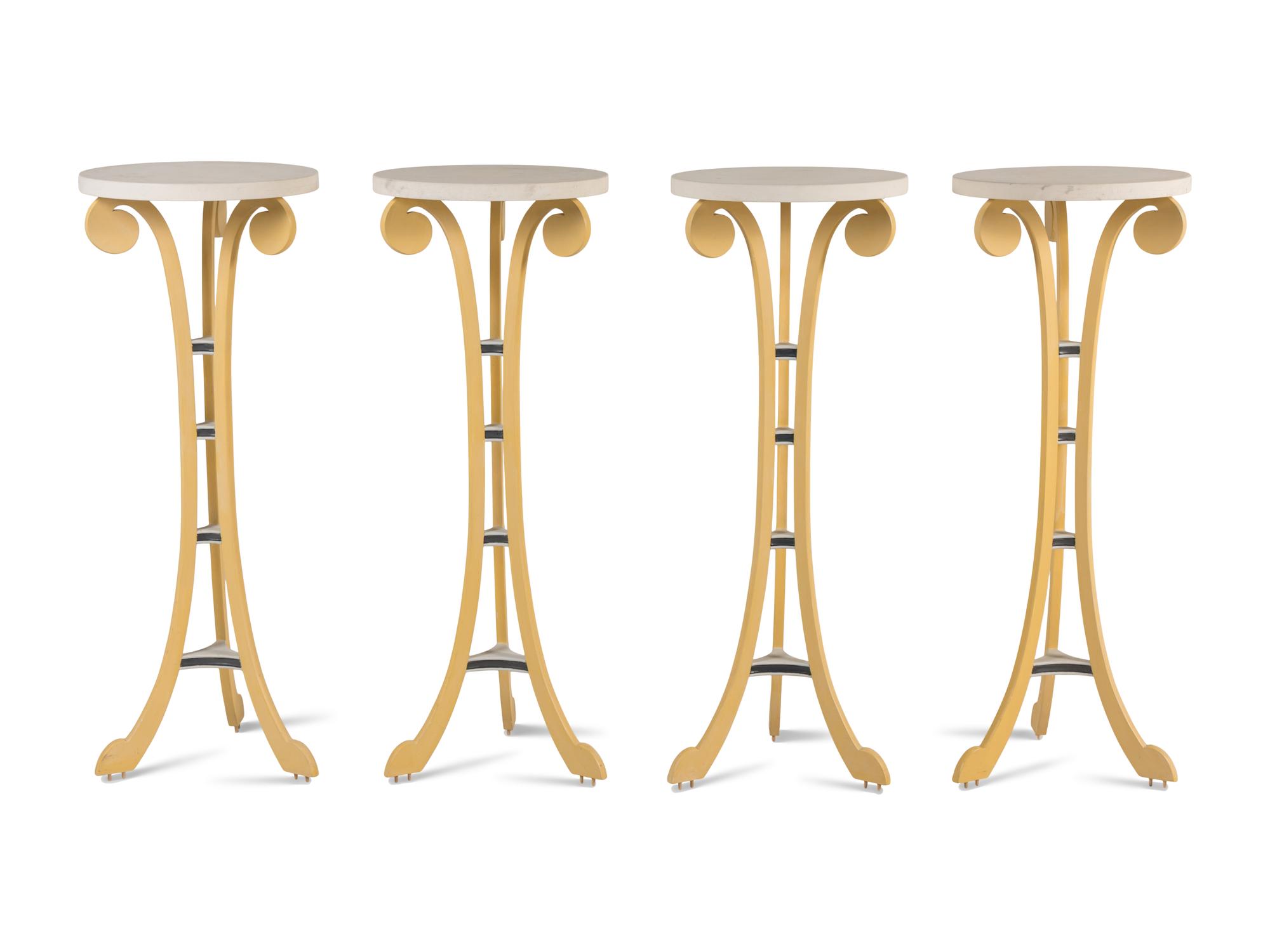 A Set of Four Painted Pedestal Tables