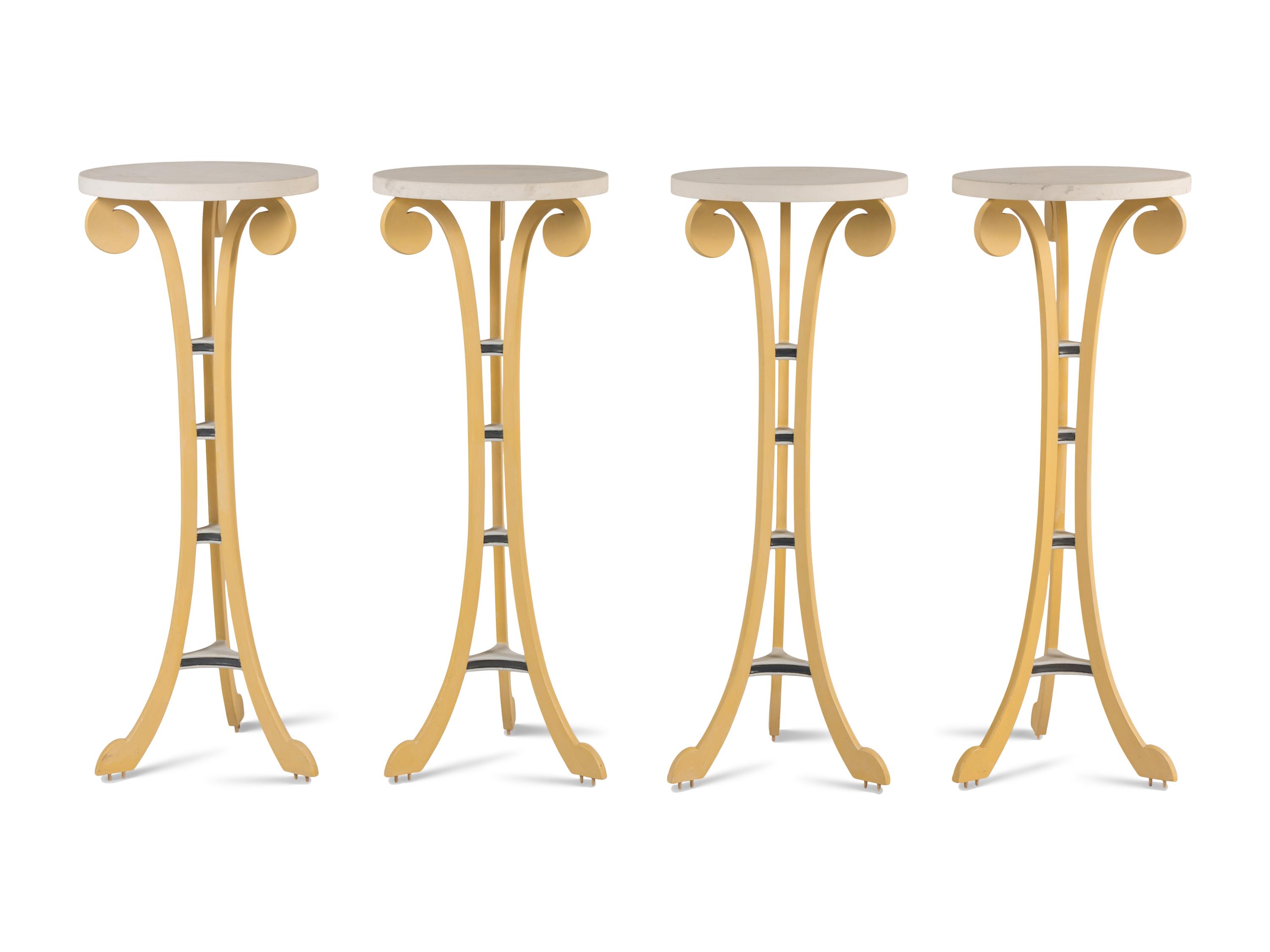 A Set of Four Painted Pedestal Tables