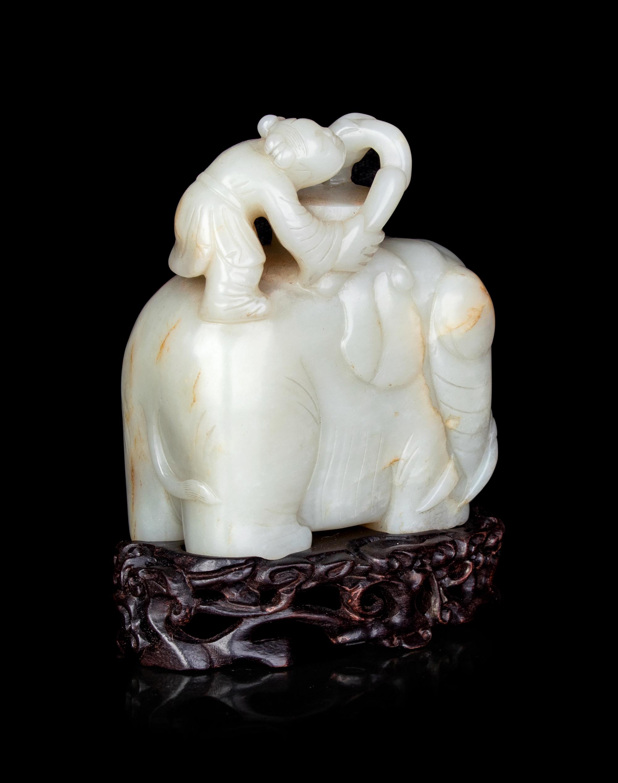 A Pale Celadon Jade 'Boy and Elephant' Group