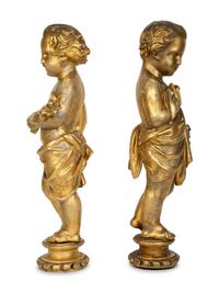 A Pair of Continental Giltwood Figures of Putti