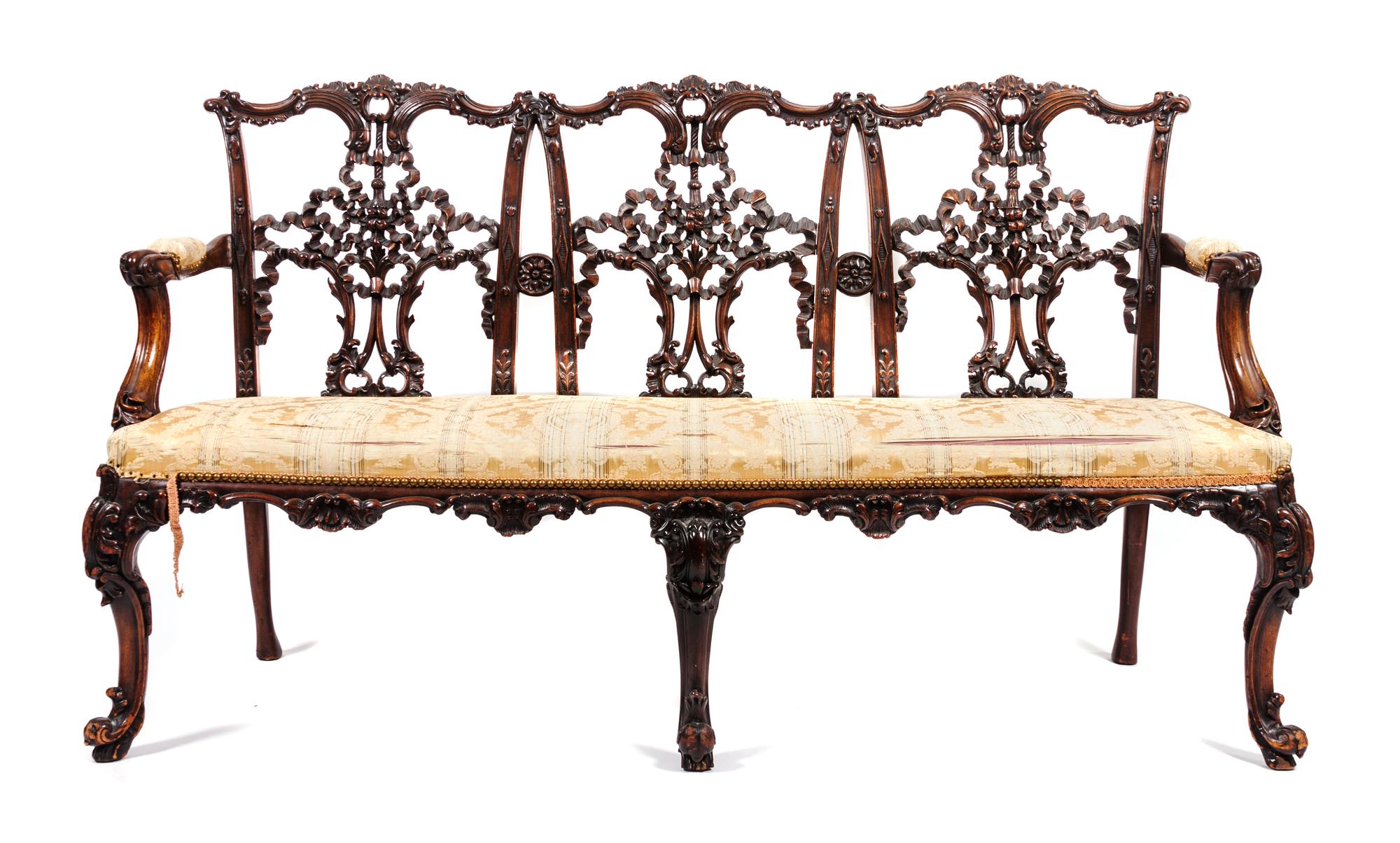 An Irish Triple Back Settee Height 36 x width 62 x depth 23 inches.