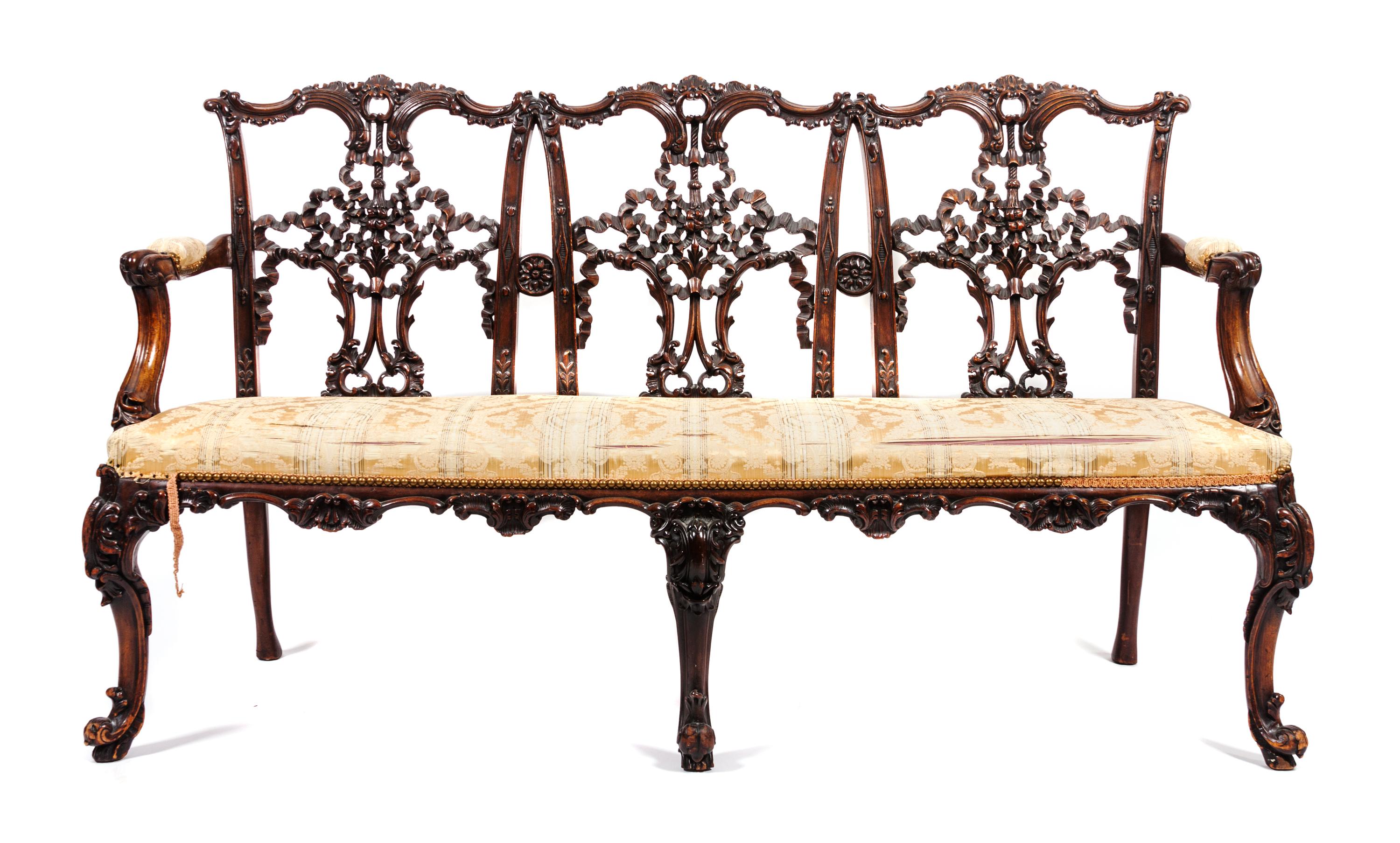 An Irish Triple Back Settee Height 36 x width 62 x depth 23 inches.