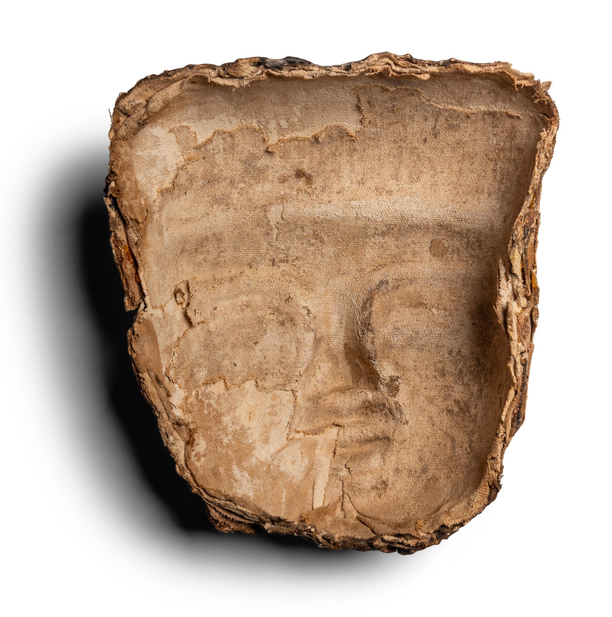 An Egyptian Cartonnage Mummy Mask