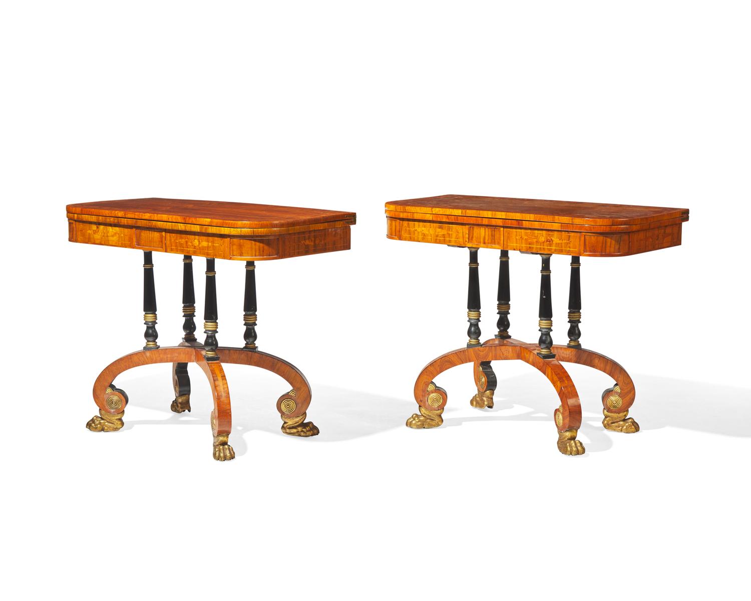 An impressive pair of Regency rosewood and parcel-gilt and ebonized games tables, circa 1820