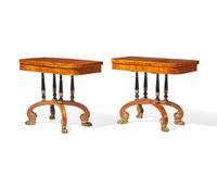 An impressive pair of Regency rosewood and parcel-gilt and ebonized games tables, circa 1820
