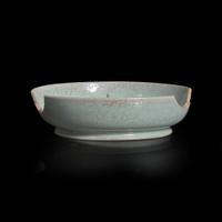 A Chinese Ru style pale blue-glazed dish or brushwasher 汝窑风格青瓷盘