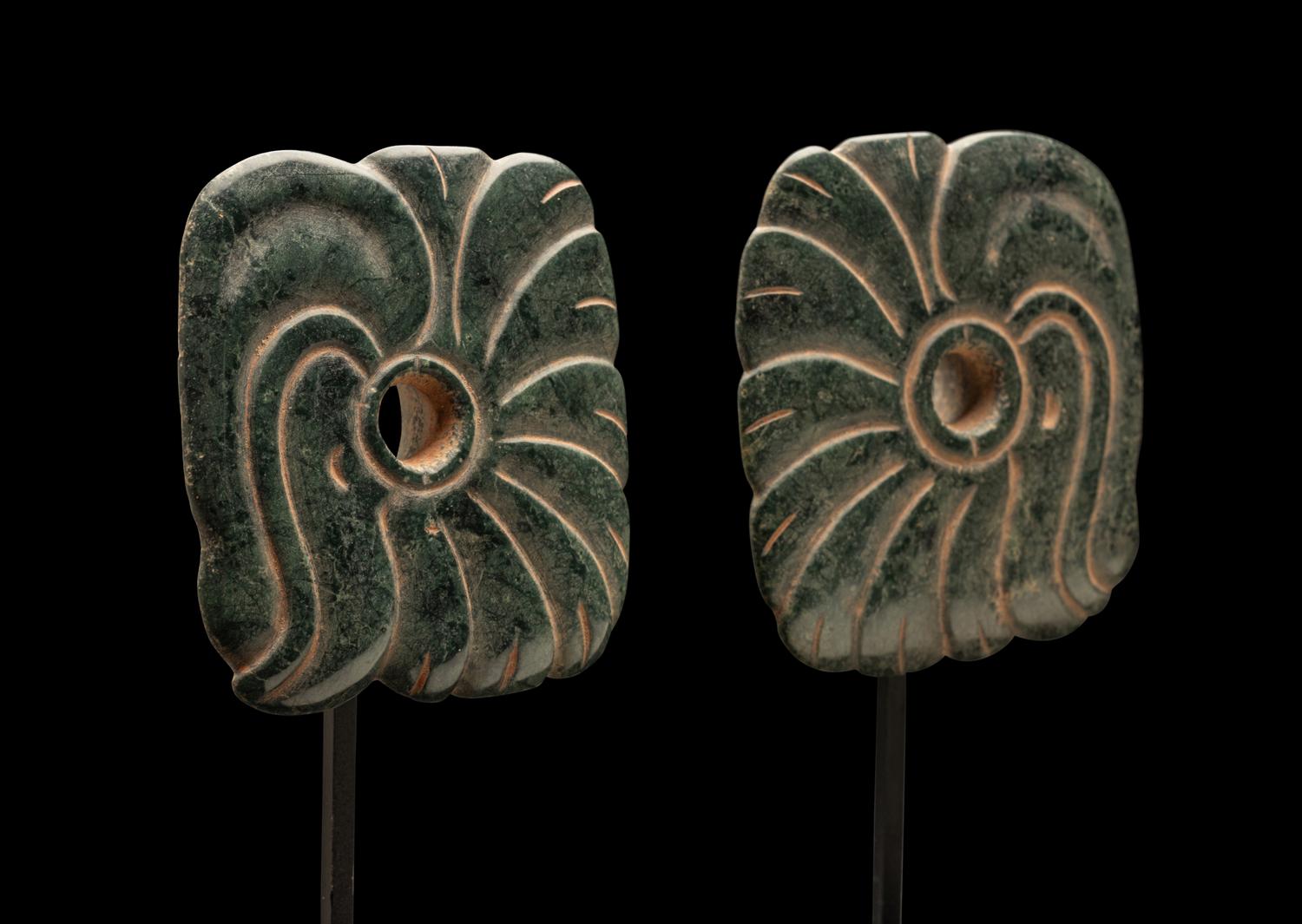 A Pair of Maya Jade Earspools in the Form of a Quetzal Bird
