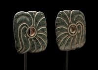 A Pair of Maya Jade Earspools in the Form of a Quetzal Bird
