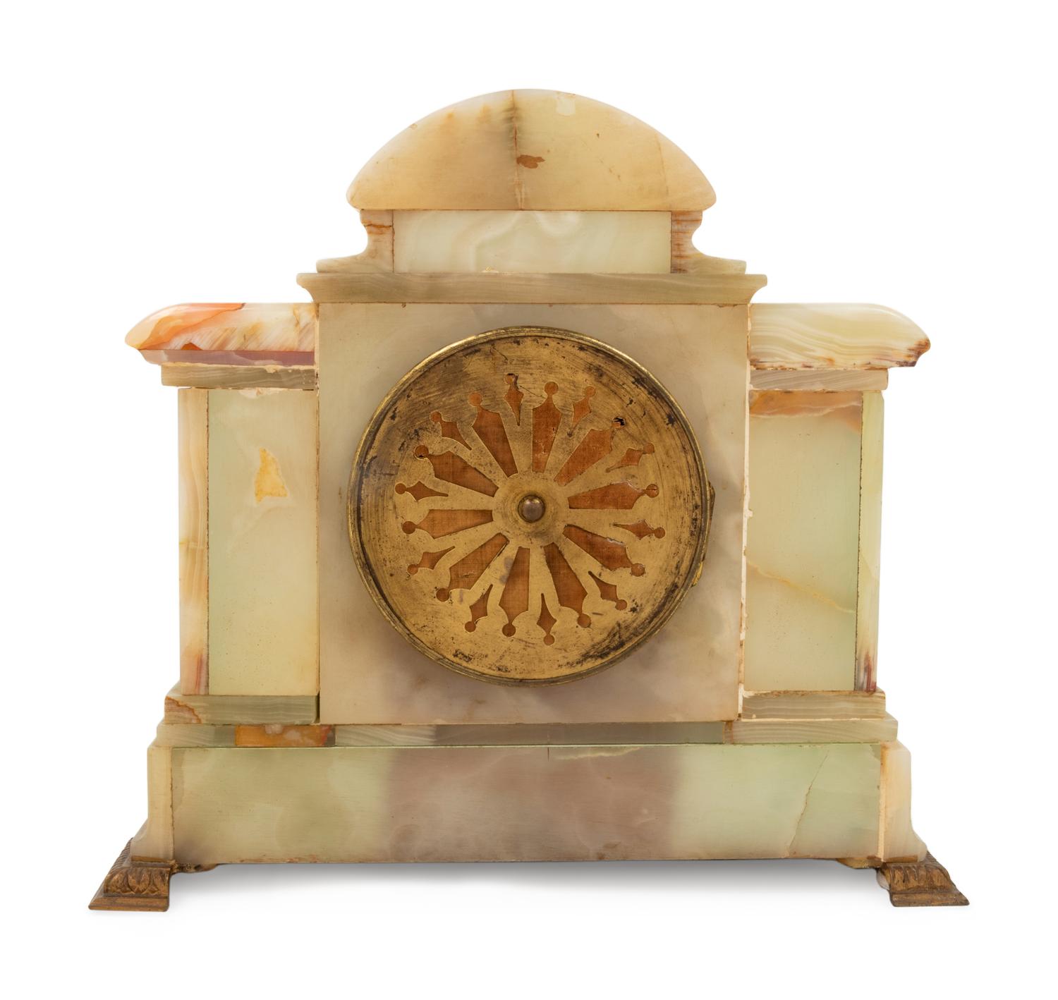 A French Onyx and Champlevé Mantel Clock