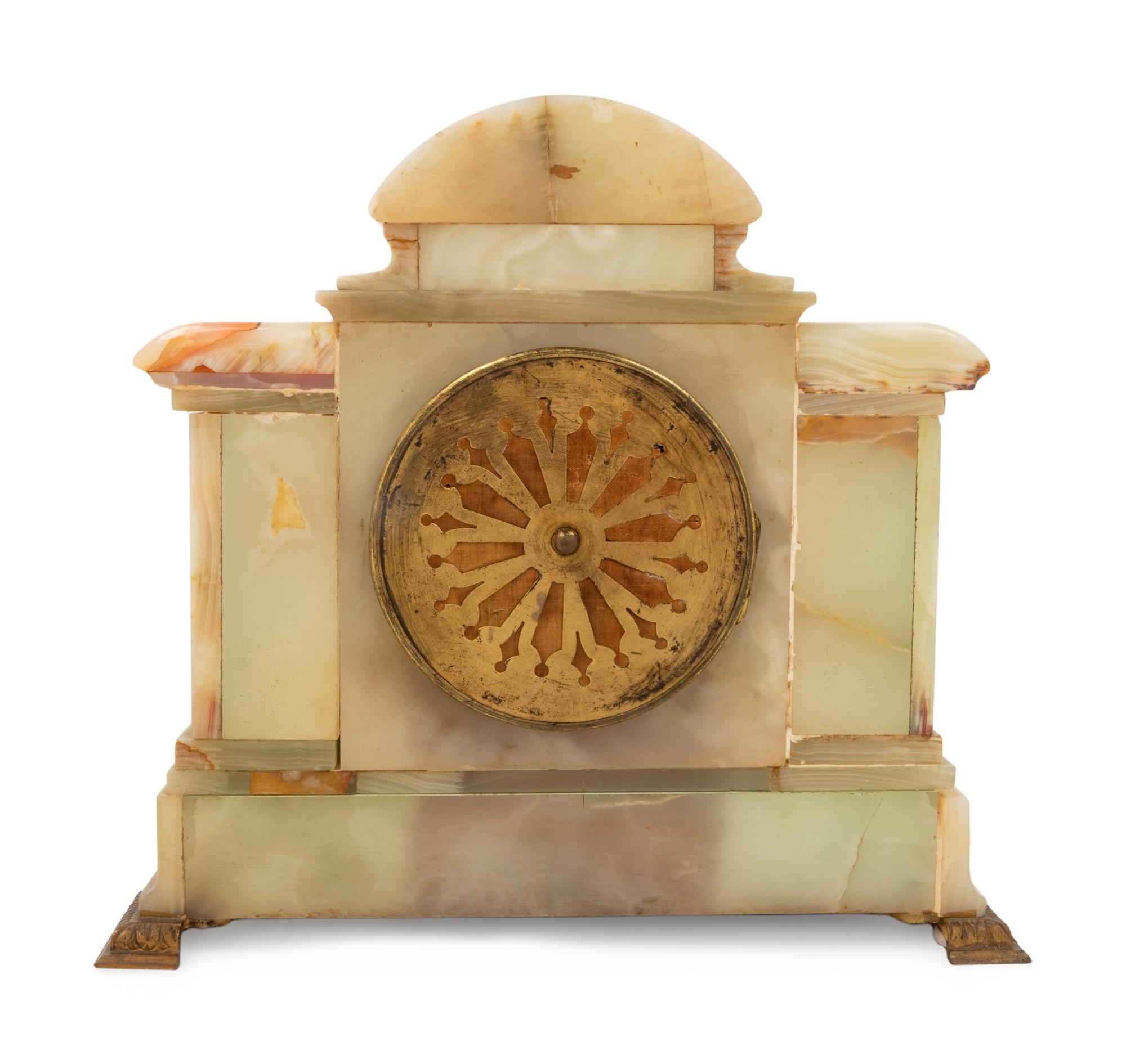 A French Onyx and Champlevé Mantel Clock