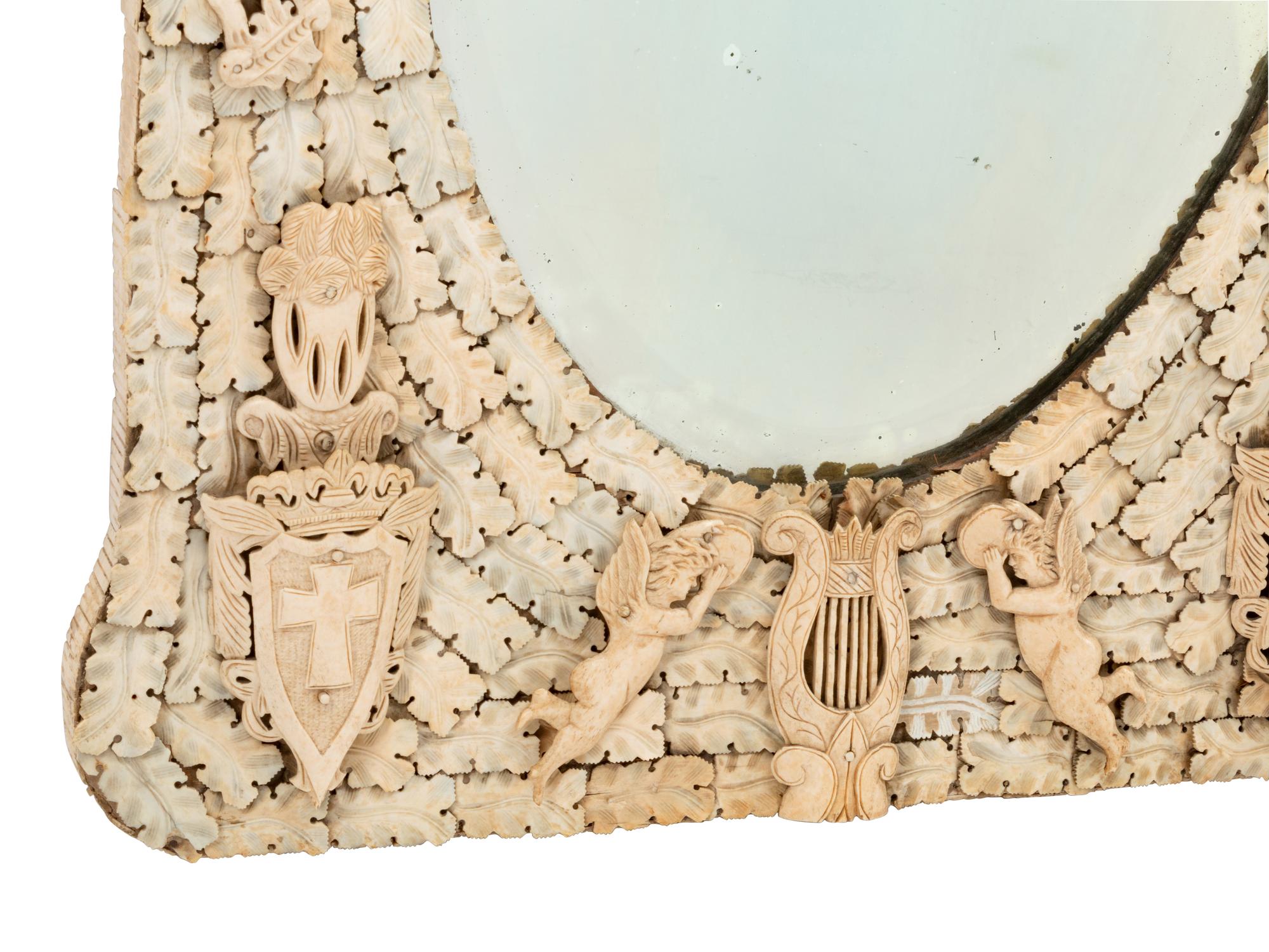 A Pair of Continental Carved Bone Mirrors