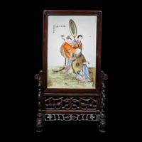 A Chinese Famille Rose Porcelain Plaque Inset Hardwood Table Screen, 20th Century 近代 红木嵌粉彩蟠桃獻壽圖瓷板插屏
