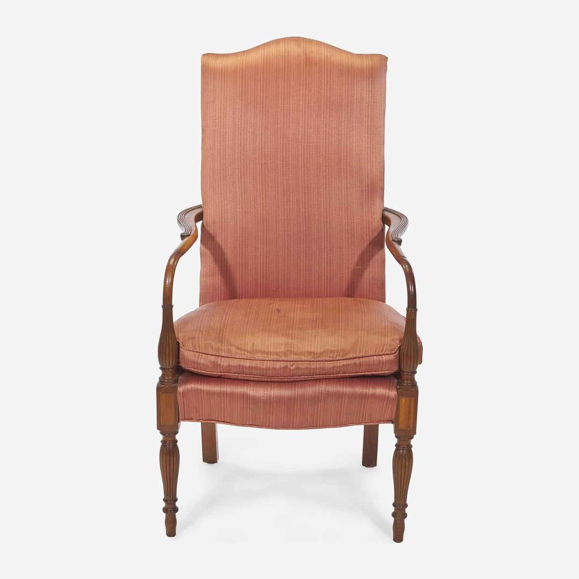 A Federal style carved and inlaid mahogany lolling chair
