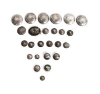 A Collection of Navajo Silver Buttons Diameter of largest 3 1/8 inches.