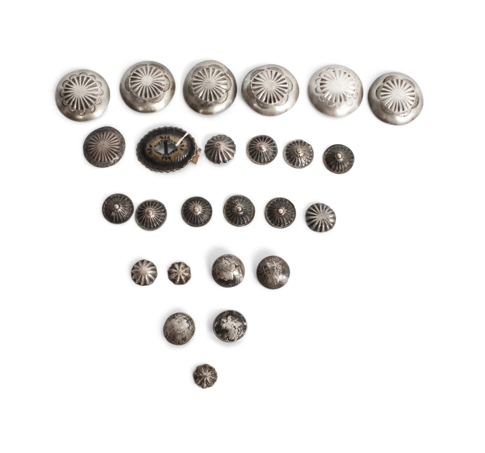 A Collection of Navajo Silver Buttons Diameter of largest 3 1/8 inches.