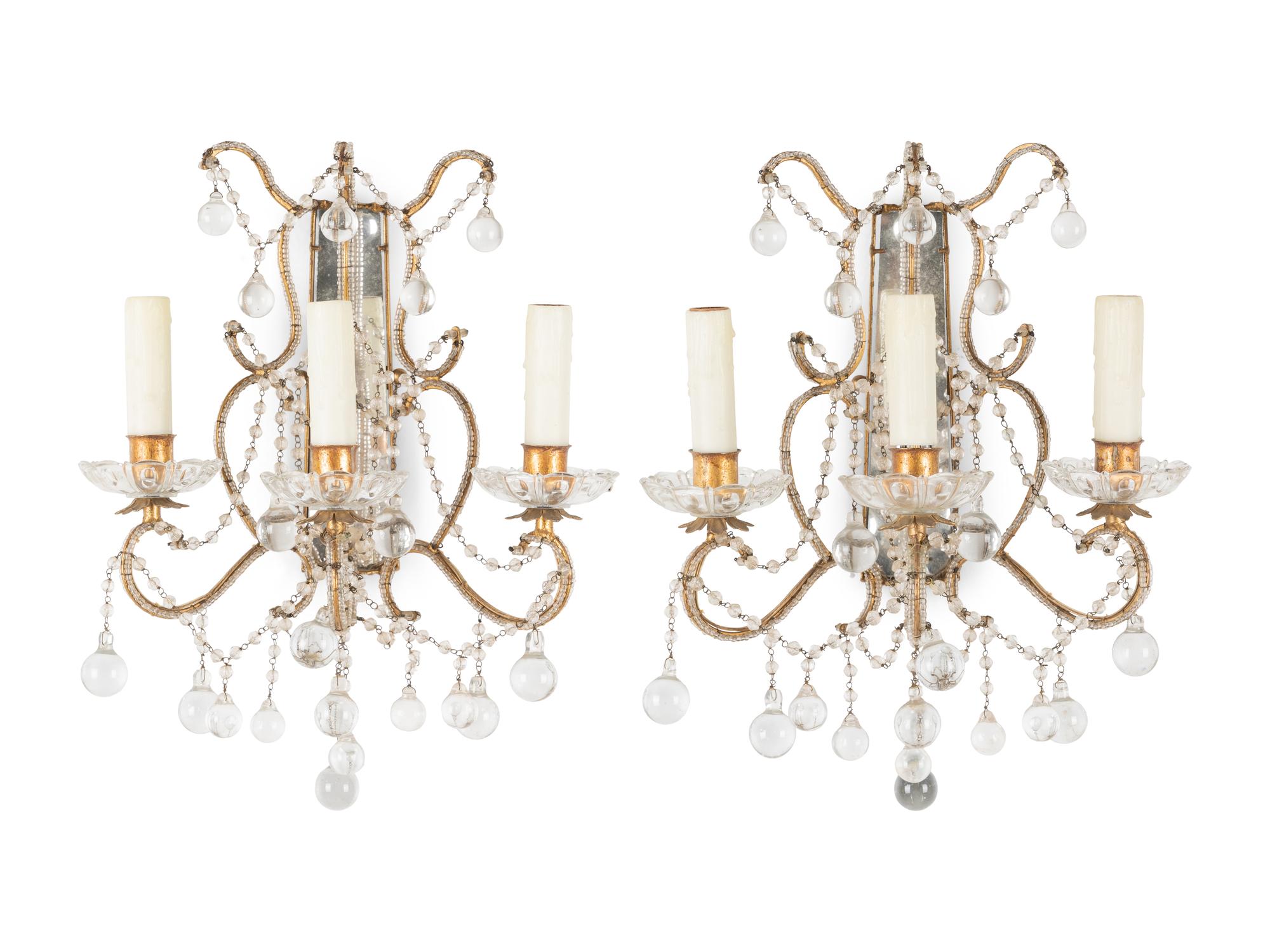 A Pair of Beaded Three-Light Sconces