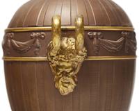 A Wedgwood Parcel-Gilt Brown Jasperware Covered Urn