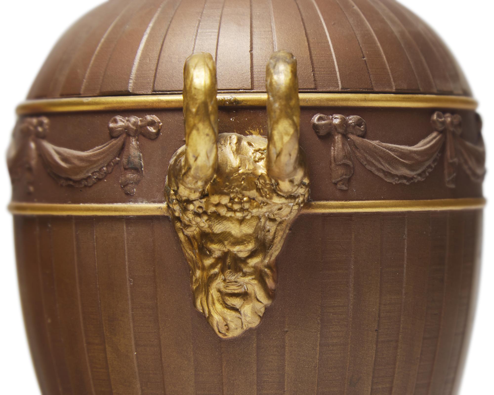 A Wedgwood Parcel-Gilt Brown Jasperware Covered Urn